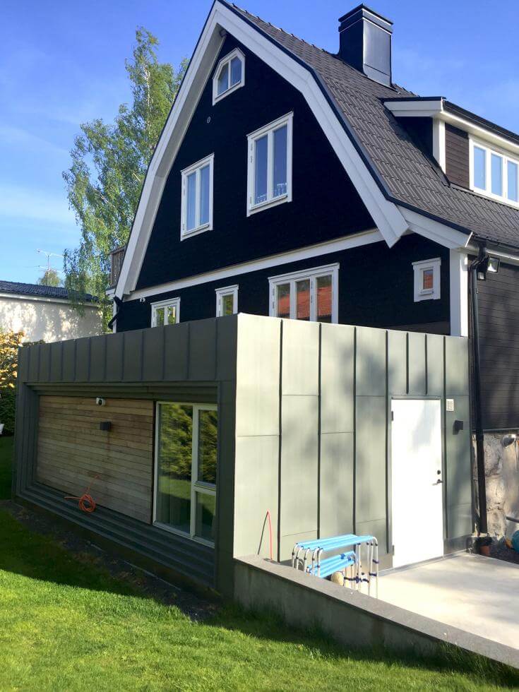 Nytt garage byggt i stil med tillbyggnaden, av Rex Arkitektbyrå