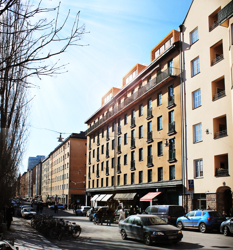 Vy från gatan på ett idéprojekt där oinredd vind omvandlas till lägenheter, ritat av Rex Arkitektbyrå